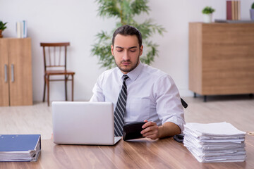 Young disabled employee suffering at workplace