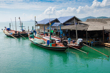 Naklejka na ściany i meble The Fisherman Village On the Clear Sea Water in Southern Thailand.