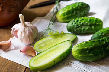 Chopped cucumbers, garlic. Fresh vegetables of the new harvest. Healthy food.