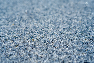  Tiny gravel texture on grey concrete wall. Texture background seamless gravel floor. Selective focus. Macro close up