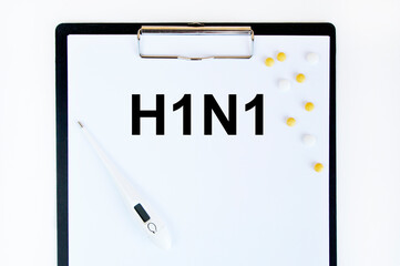 Paper with words H1N1 diseases and stethoscope.