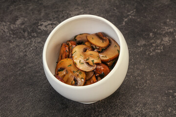 Roasted champignon with herbs and spices