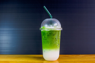 A close-up view of the drinks put into the cup, (iced tea, cocoa, chocolate) with pearls, is a popular menu in cafes and restaurants.
