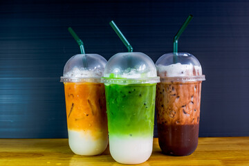 A close-up view of the drinks put into the cup, (iced tea, cocoa, chocolate) with pearls, is a popular menu in cafes and restaurants.