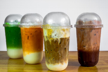 A close-up view of the drinks put into the cup, (iced tea, cocoa, chocolate) with pearls, is a popular menu in cafes and restaurants.