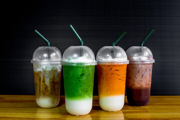 A close-up view of the drinks put into the cup, (iced tea, cocoa, chocolate) with pearls, is a popular menu in cafes and restaurants.