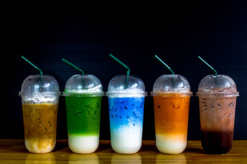 A close-up view of the drinks put into the cup, (iced tea, cocoa, chocolate) with pearls, is a popular menu in cafes and restaurants.