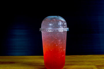 A close-up view of the drinks put into the cup, (iced tea, cocoa, chocolate) with pearls, is a popular menu in cafes and restaurants.