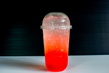 A close-up view of the drinks put into the cup, (iced tea, cocoa, chocolate) with pearls, is a popular menu in cafes and restaurants.