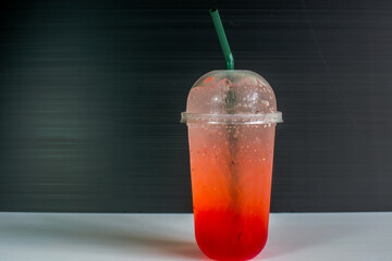 A close-up view of the drinks put into the cup, (iced tea, cocoa, chocolate) with pearls, is a popular menu in cafes and restaurants.