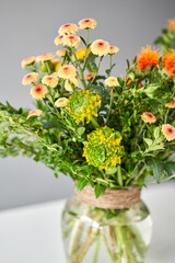 Series, step by step installation of flowers in a vase. Flowers bunch, set for home. Fresh cut flowers for decoration home. European floral shop. Delivery fresh cut flower.
