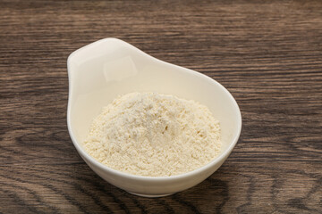 Wheat flour heap in the bowl