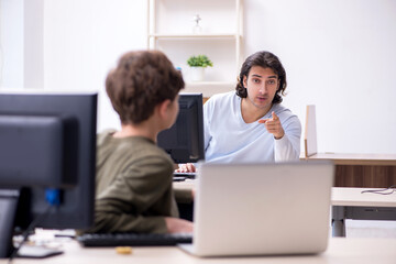 Father and son in it concept