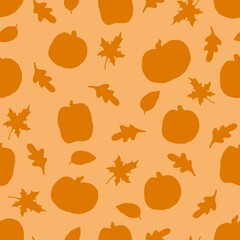 seamless pattern with pumpkins and autumn leaves. orange halloween.