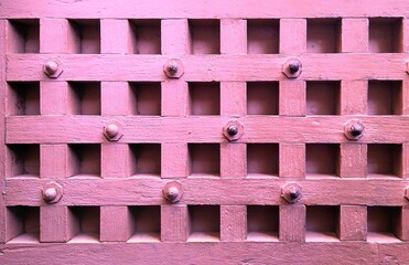 pink fence with a flower