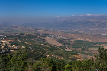 Fototapeta na wymiar View of Southern Lebanon and Northern Israel with the concrete wall built along the international border, as seen from kibbutz Misgav-Am lookout point, Upper Galilee, Israel.