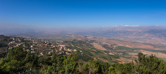 View of Southern Lebanon and Northern Israel with the concrete wall built along the international...