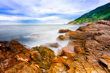 The sea spray hitting the rocks in the afternoon at Khao Laemya National Park Thailand.