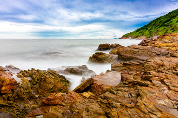 The sea spray hitting the rocks in the afternoon at Khao Laemya National Park Thailand.