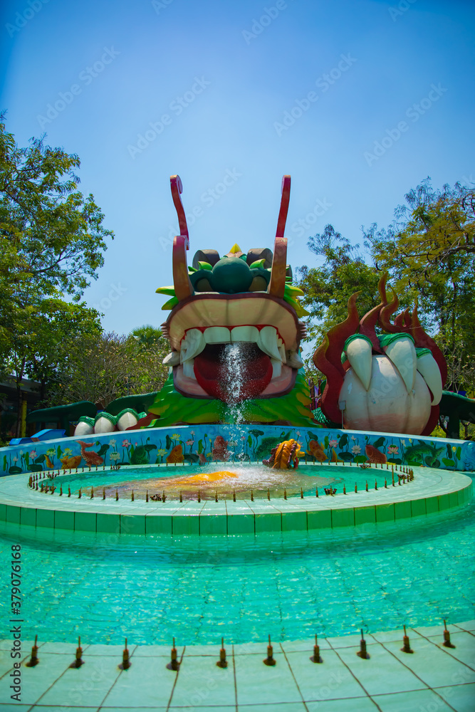 Wall mural A big statue dragon at Suoi Tien park in Ho Chi Minh Vietnam wide shot