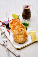 Potato pancakes stuffed with chopped trout