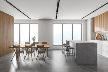 Fototapeta premium White and wooden kitchen with table, side view