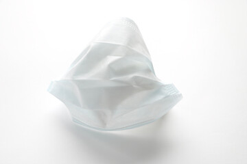 Medical mask on a white background. Virus protection. Prevention.