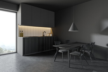 Gray and wooden kitchen corner with table