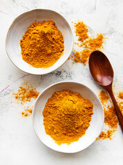 Bowls with turmeric powder