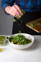 Cooking vegan food, salad in large bowl