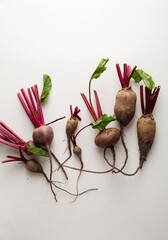 Overhead view of Organic beetroots on light surface