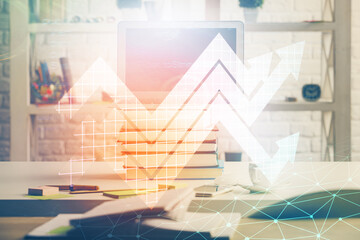 Computer on desktop with point up arrows hologram. Double exposure. Concept of success.