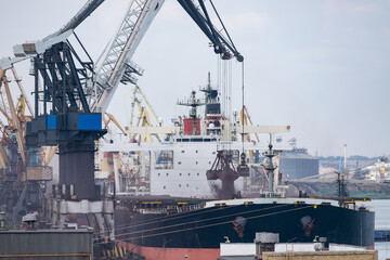 Cranes loading ship