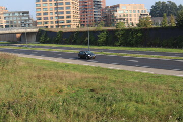 car panning on highway.