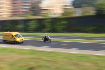 car panning on highway.
