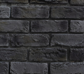 decorative texture of gray old burnt bricks in soot