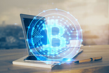 Double exposure of blockchain theme hologram and table with computer background. Concept of bitcoin...