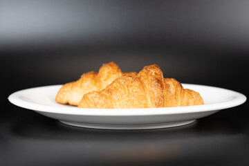 croissant bread and black background