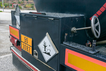 Danger labels on a dangerous goods tank truck
