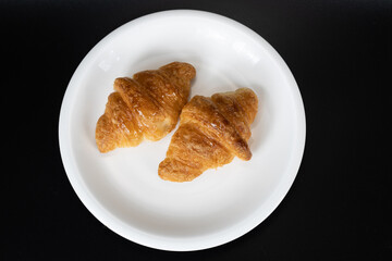 croissant bread and black background