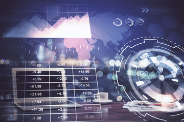 Stock market chart hologram drawn on personal computer background. Double exposure. Concept of investment.