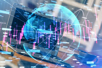 Fototapeta premium Financial graph colorful drawing and table with computer on background. Double exposure. Concept of international markets.