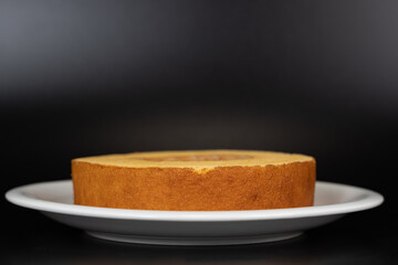 single baumkuchen cake black background