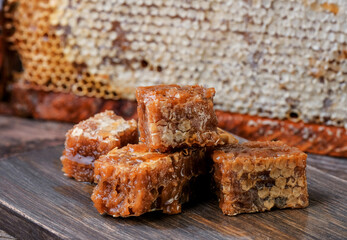 Homemade honeycomb at the wooden background