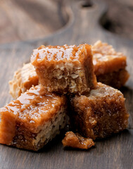 Homemade honeycomb at the wooden background