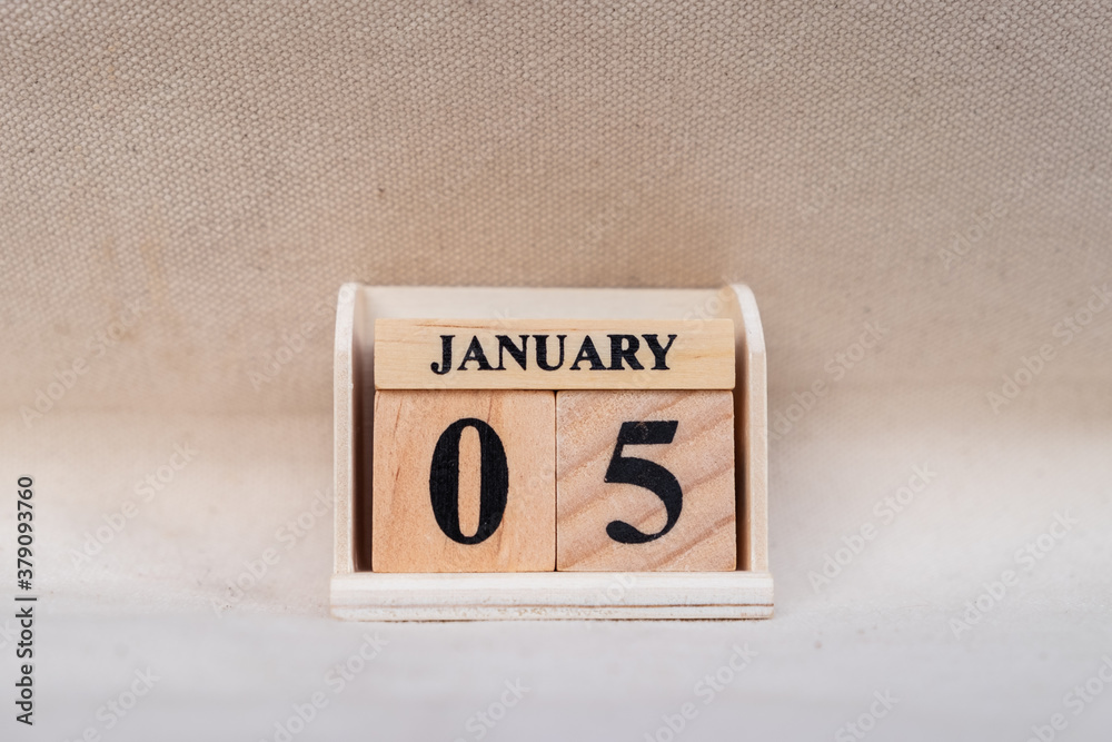 Fototapete january 5th. image of jan 5 wooden color calendar on white canvas background. empty space for text