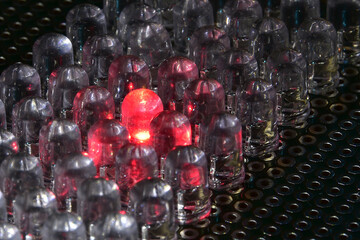 Low-power semiconductor red LEDs in transparent plastic housing. Demonstration of the classic indicator for electronic systems.