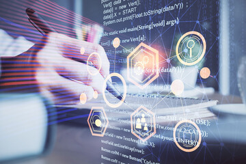 Multi exposure of woman's hands on background with technology and digital coding icons. Data development concept.