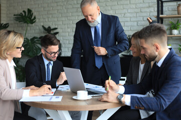 Businessmen teamwork brainstorming meeting to discuss plans of the investment.