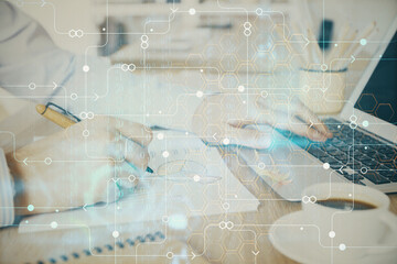 Businessman working on Laptop with technology theme drawing. Concept of big data. Double exposure.